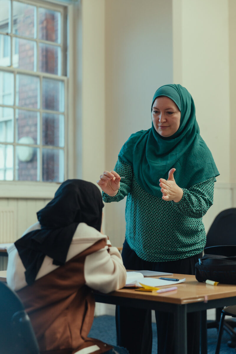 Miss Natalie, KS3 Leader and English teacher, teaching a class